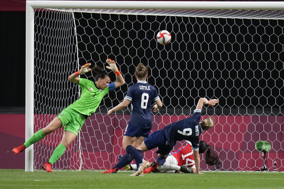 Britain's Ellen White (9) scores her side's opening goal against Chile during a women's soccer match at the 2020 Summer Olympics, Wednesday, July 21, 2021, in Sapporo, Japan. (AP Photo/Silvia Izquierdo)