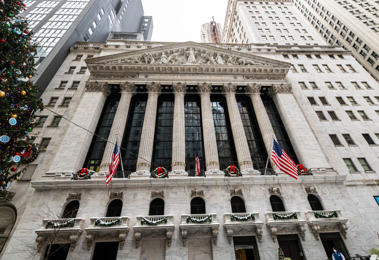 NEW YORK, NEW YORK - DECEMBER 18: A view of the New York Stock Exchange in Wall Street as the city continues the re-opening efforts following restrictions imposed to slow the spread of coronavirus on December 18, 2020 in New York City. The pandemic has caused long-term repercussions throughout the tourism and entertainment industries, including temporary and permanent closures of historic and iconic venues, costing the city and businesses billions in revenue. (Photo by Noam Galai/Getty Images)