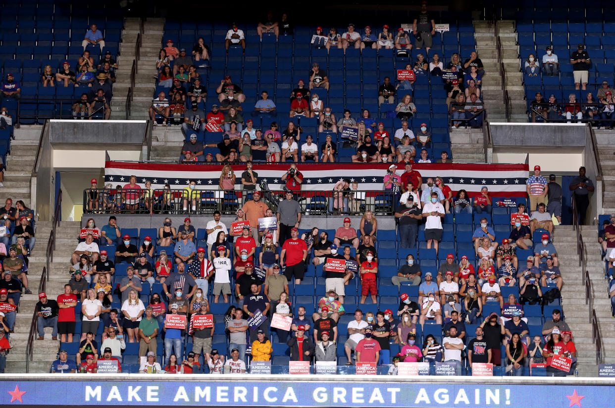 TULSA, OKLAHOMA - JUNE 20: Supporters listen as U.S. President Donald Trump speaksat  a campaign rally at the BOK Center, June 20, 2020 in Tulsa, Oklahoma. Trump is holding his first political rally since the start of the coronavirus pandemic at the BOK Center today while infection rates in the state of Oklahoma continue to rise. (Photo by Win McNamee/Getty Images)