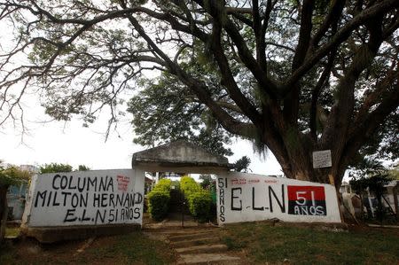 A graffiti, of rebel group Army Liberation National (ELN) is seen at the entrance of the cemetery of El Palo, Cauca, Colombia, February 10, 2016. REUTERS / Jaime Saldarriaga