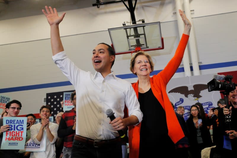 Democratic 2020 U.S. presidential candidate Warren is welcomed to the stage by Castro in Marshalltown