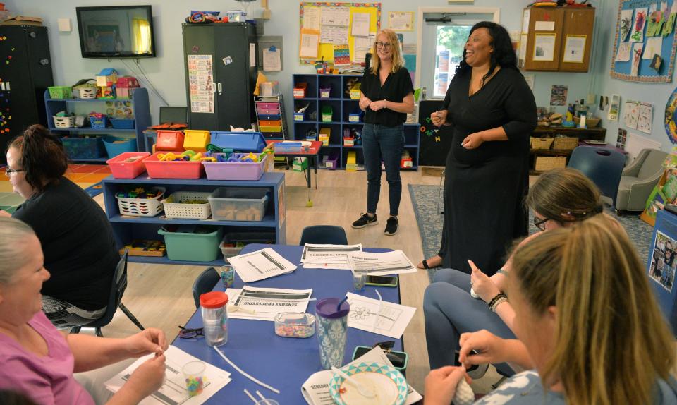 Early childhood mental health consultants Kimberly Harvey, left and Nashaylia Jenkins, conduct a workshop Monday, April 10, 2023, for teachers at Bright Beginnings Preschool in Sarasota. 