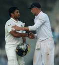 Cricket - India v England - Fifth Test cricket match - MA Chidambaram Stadium, Chennai, India - 19/12/16 - India's Karun Nair is congratulated by England's Joe Root on his triple century. REUTERS/Danish Siddiqui