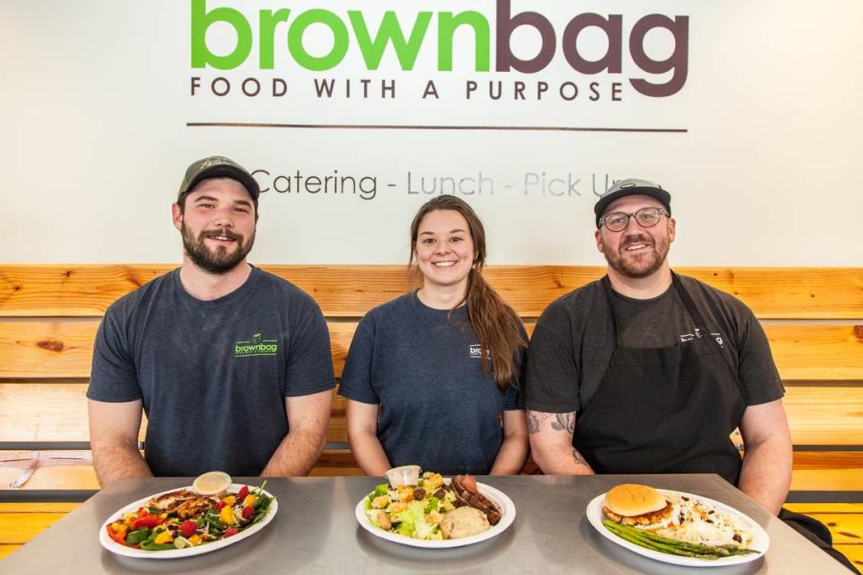 Andrew Howard, left, Christy Warren and Dan Mathewson of Brown Bag.