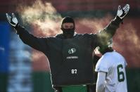 Saskatchewan Roughriders Aaron Hargreaves gestures during team practice in Regina, Saskatchewan, November 22, 2013. The Saskatchewan Roughriders will play against the Hamilton Tiger-Cats in the CFL's 101st Grey Cup in Regina. REUTERS/Mark Blinch (CANADA - Tags: SPORT FOOTBALL)