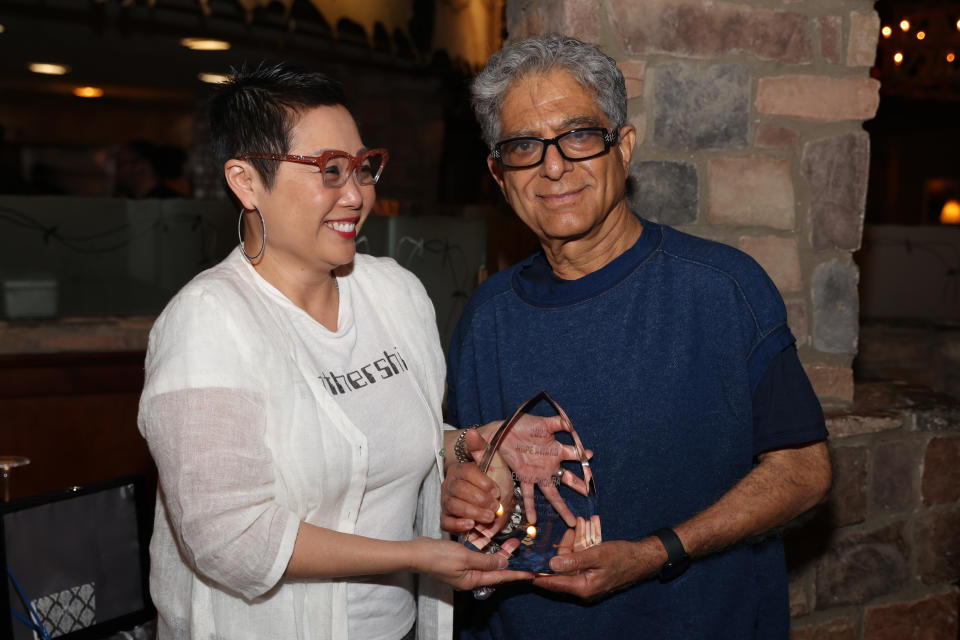 Ceci Chan presents the 2023 Hope Award to Deepak Chopra March 11, 2023 in Austin, Texas.