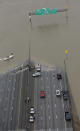 <p>Interstate 10 is closed due to floodwaters from Tropical Storm Harvey Tuesday, Aug. 29, 2017, in Houston. (Photo: David J. Phillip/AP) </p>