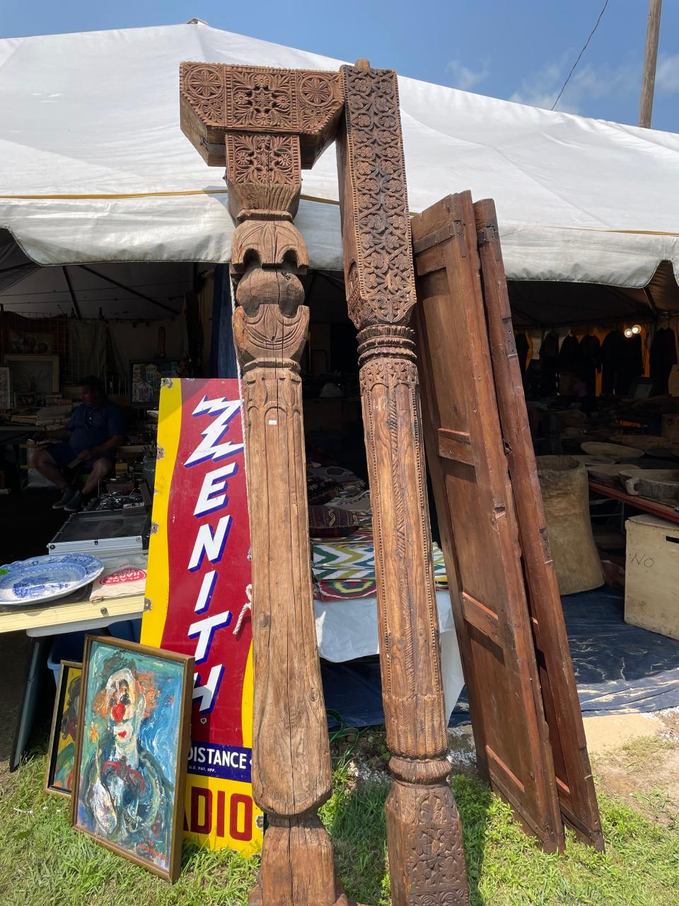 Carved pillars, brought from Pakistan by Janbaz Khan, owner of Silk Road Handicrafts, at Sturtevant