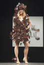 <p>Taking a cue from Alexander McQueen, this dress is composed of lots of chocolate butterflies from head to toe.</p>