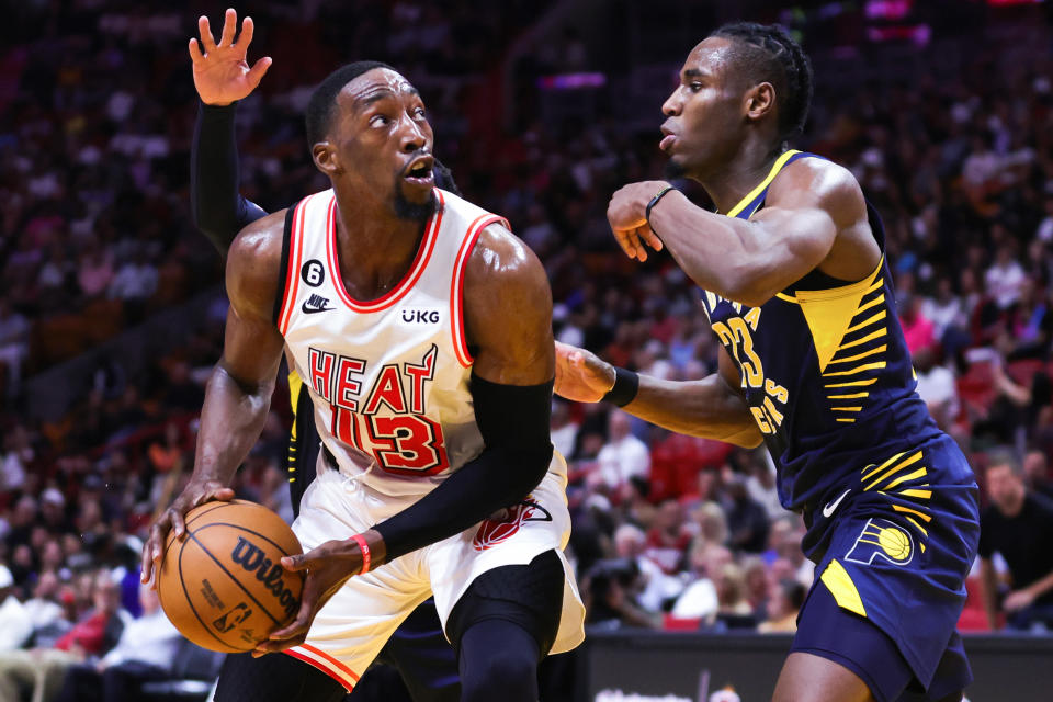 MIAMI, FLORIDA - FEBRUARY 08: Bam Adebayo #13 of the Miami Heat drives to the basket against the Indiana Pacers during the fourth quarter at Miami-Dade Arena on February 08, 2023 in Miami, Florida. NOTE TO USER: User expressly acknowledges and agrees that, by downloading and or using this photograph, User is consenting to the terms and conditions of the Getty Images License Agreement. (Photo by Megan Briggs/Getty Images)