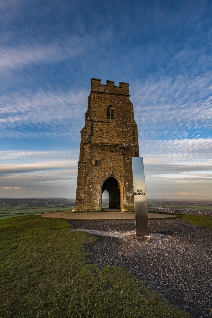 A silver monolith bearing the words “not Banksy” appeared on Glastonbury Tor in 2020. Michelle Cowbourne / SWNS