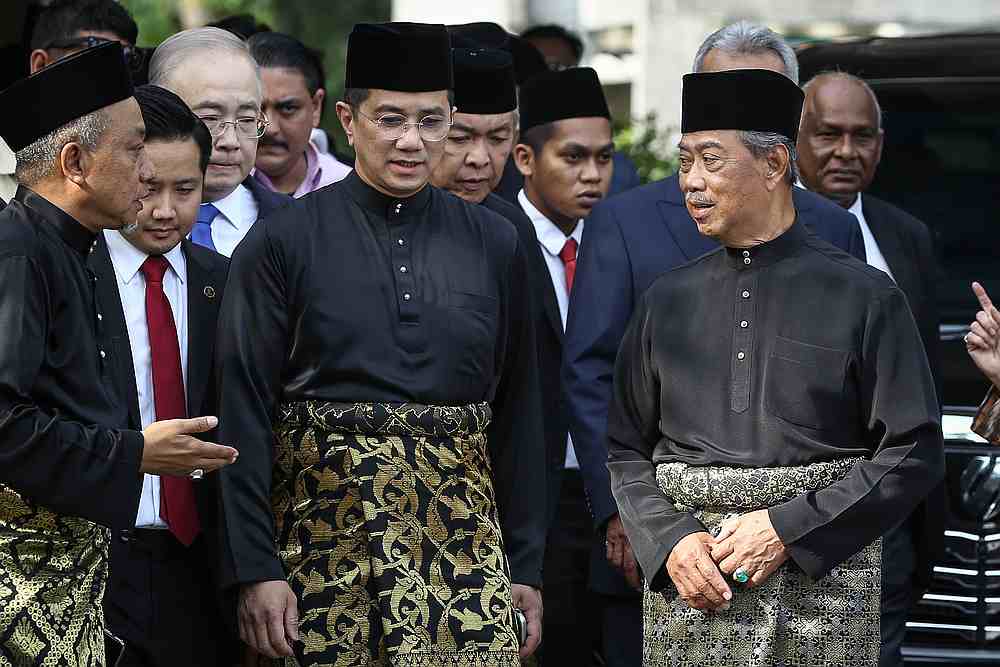 Datuk Seri Mohamed Azmin Ali (centre)  and other party leaders gather at the residence of Tan Sri Muhyiddin Yassin (right) leaving for the Istana Negara in Kuala Lumpur March 1, 2020. — Picture by Yusof Mat Isa