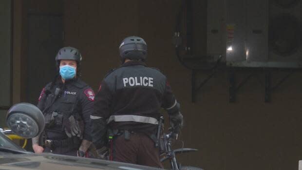 Calgary police were stationed outside the Nuvo Hotel in the Beltline neighbourhood on Wednesday afternoon.