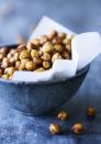 <p>Lentils <a rel="nofollow noopener" href="https://www.womansday.com/food-recipes/food-drinks/g2641/green-bean-recipes/" target="_blank" data-ylk="slk:and beans;elm:context_link;itc:0;sec:content-canvas" class="link ">and beans</a> are great <a rel="nofollow noopener" href="https://academic.oup.com/ajcn/article/103/5/1213/4569588" target="_blank" data-ylk="slk:foods for weight loss;elm:context_link;itc:0;sec:content-canvas" class="link ">foods for weight loss</a>, but chickpeas also belong in your pantry. They contain a whopping 39 grams of protein per cup, which nearly meets your<a rel="nofollow noopener" href="http://www.nationalacademies.org/hmd/~/media/Files/Activity%20Files/Nutrition/DRI-Tables/8_Macronutrient%20Summary.pdf?la=en" target="_blank" data-ylk="slk:recommended daily amount from the USDA;elm:context_link;itc:0;sec:content-canvas" class="link "> recommended daily amount from the USDA</a>, so you're guaranteed to stay full for awhile after noshing on these beauties. Most eat them in hummus form, but you could also toss them in seasonings and roast in the oven, which you can then sprinkle into meals or eat alone for a crunchy snack. <br></p>