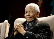 FILE PHOTO: Former South African President Mandela attends the Sixth Annual Nelson Mandela lecture in Kliptown