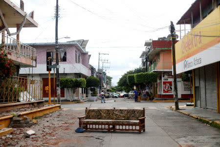 Furniture is seen in a street after an earthquake struck the southern coast of Mexico late on Thursday, in Juchitan, Mexico, September 10, 2017. REUTERS/Edgard Garrido