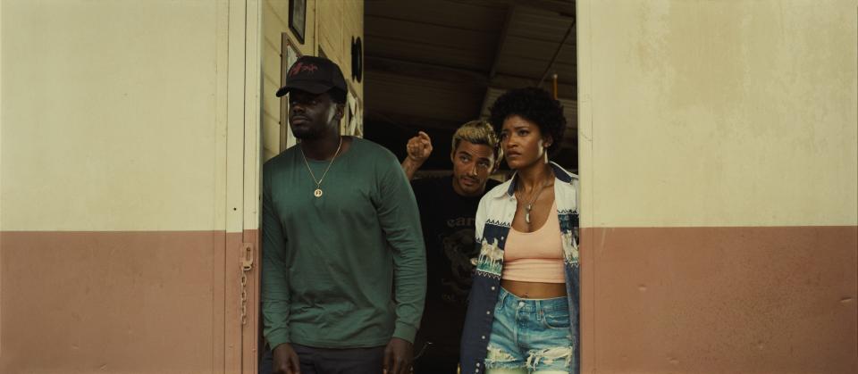 OJ (Daniel Kaluuya, from left), Angel (Brandon Perea) and Emerald (Keke Palmer) try to figure out what's up with the weird airborne object invading a California gulch town in Jordan Peele's "Nope."