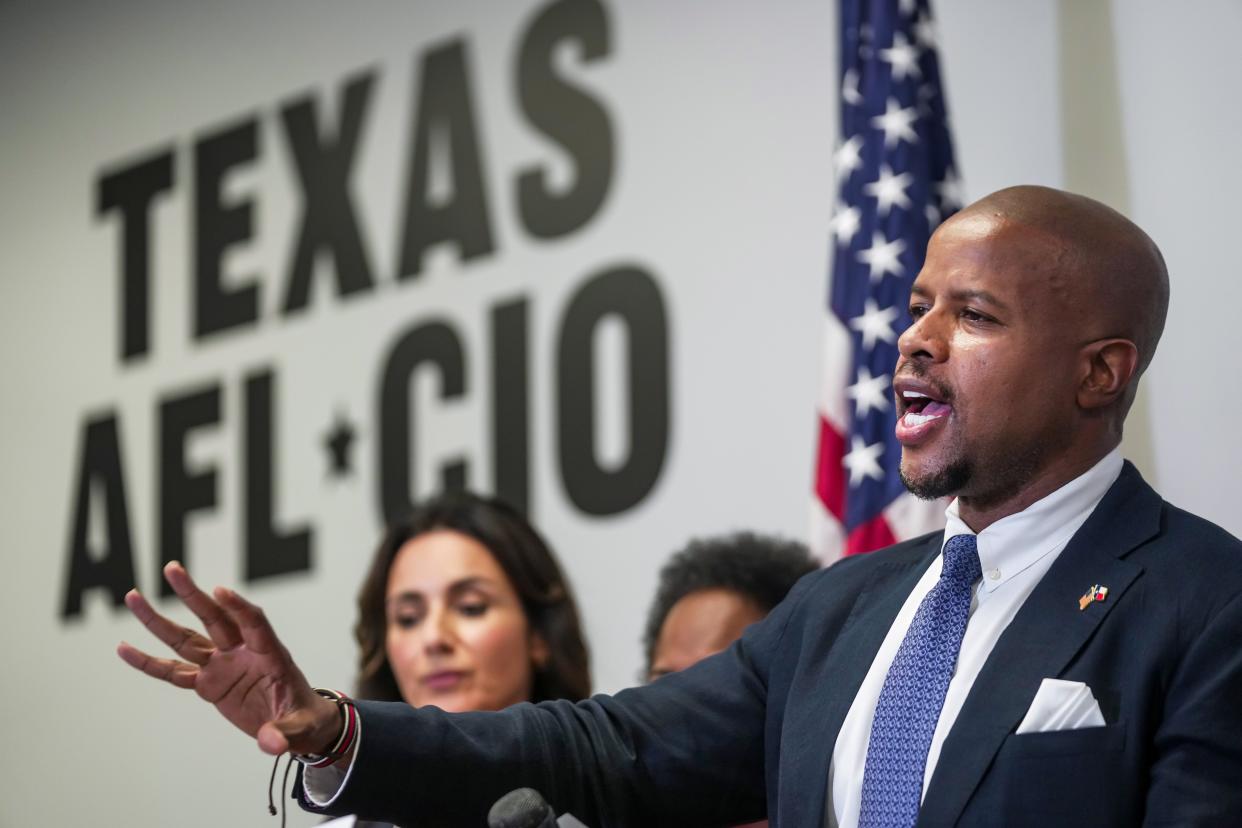 Rep. Ron Reynolds, chair of the Texas Legislative Black Caucus, joins University of Texas faculty members, legal experts and students at a news conference Wednesday to discuss how anti-DEI legislation led to UT laying off more than 60 staff members this month.