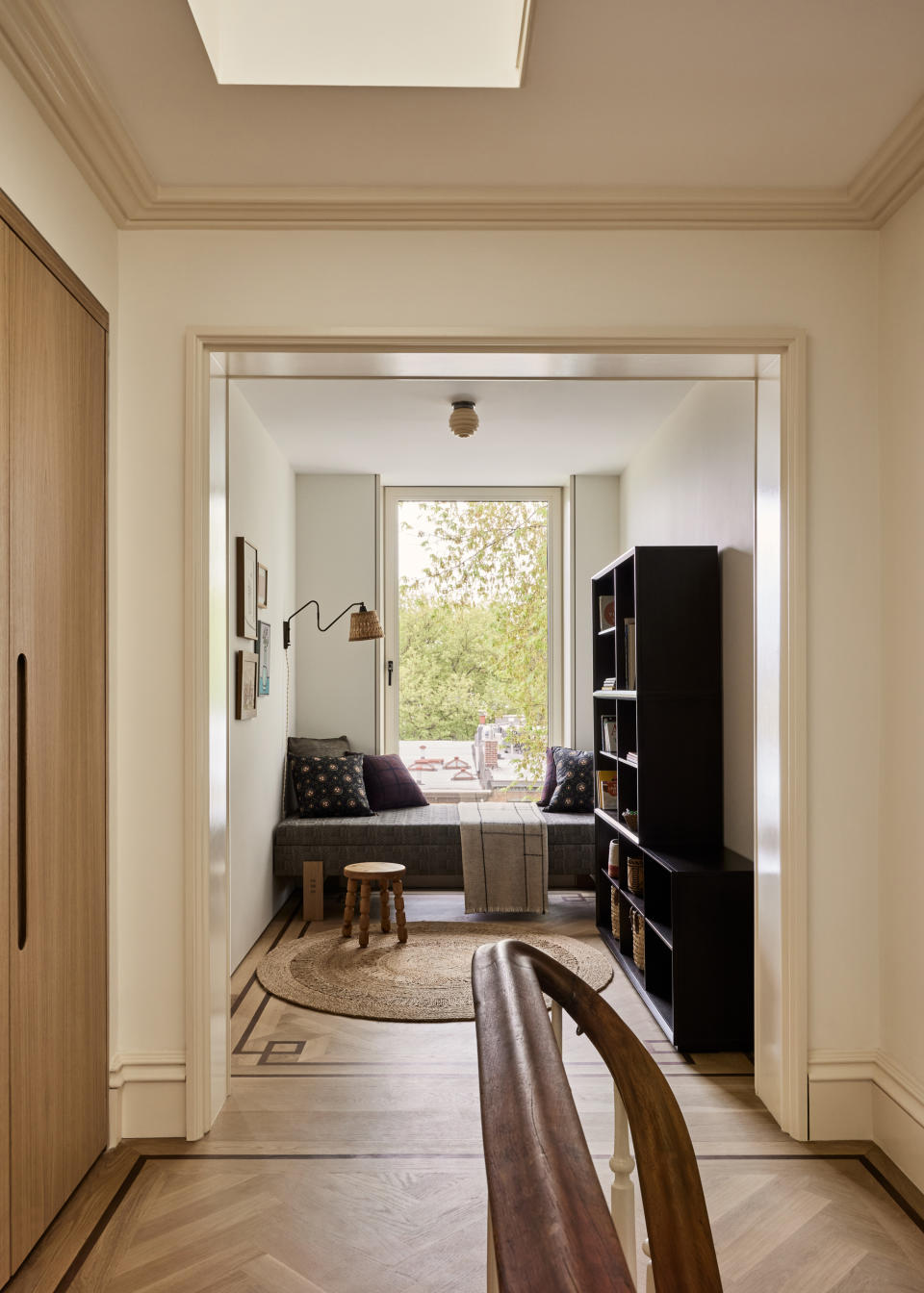 A reading corner with bench and window view