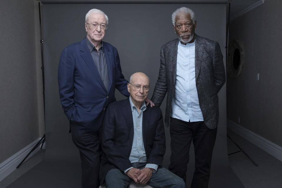 In this March 27, 2017 photo, actors Michael Caine, from left, Alan Arkin and Morgan Freeman pose for a portrait to promote their new film "Going in Style" in New York. (Photo by Amy Sussman/Invision/AP)