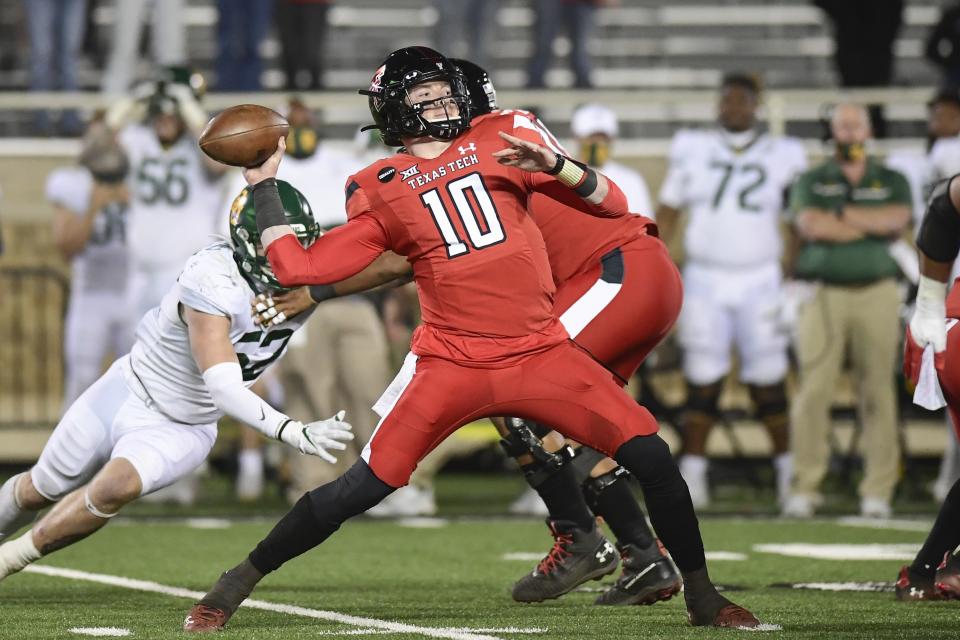 Texas Tech quarterback Alan Bowman (10) throws against Baylor in the second half of an NCAA college football game in Lubbock, Texas, Saturday, Nov. 14, 2020. (AP Photo/Justin Rex)