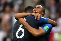 <p>Steven Nzonzi and Paul Pogba embrace at the end of the game. (Photo by Dan Mullan/Getty Images) </p>