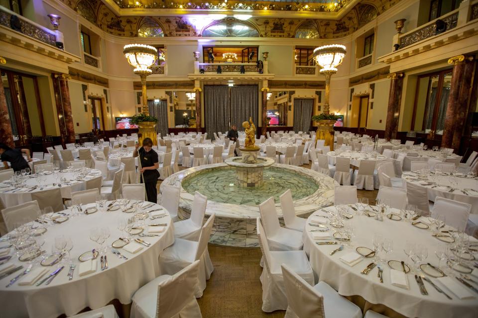 This photo taken on Thursday, Feb. 21, 2019 shows a view of the restaurant inside Moscow's iconic Metropol Hotel in Moscow, Russia. The Metropol, across the street from the Bolshoi Theater and 500 meters from Red Square, became a favorite with world leaders and celebrities. In 2009, U.S. President Barak Obama also gave a speech at the hotel. (AP Photo/Alexander Zemlianichenko)