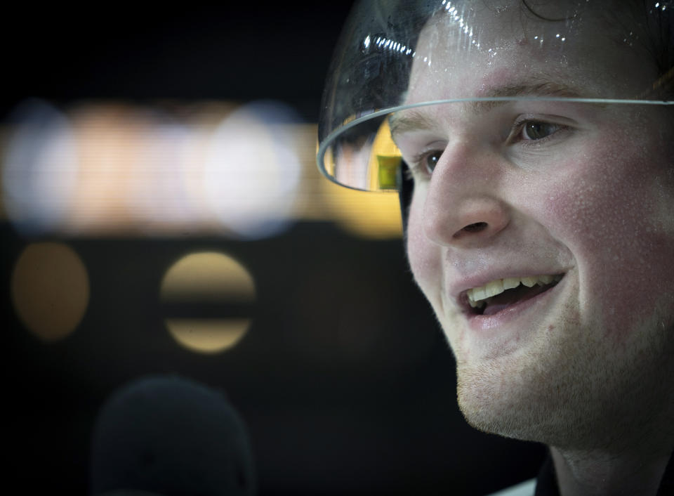 FILE - In this Jan. 16, 2020, file photo, Team White left winger Alexis Lafreniere smiles following hockey's CHL Top Prospects Game in Hamilton, Ontario. Lafrenière has nothing to do but wait now that his Canadian junior hockey season is over, and uncertainty over when the NHL draft will take place as a result of the new coronavirus. (Peter Power/The Canadian Press via AP, File)