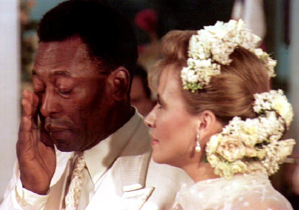 Brazilian soccer legend Edson Arantes do Nascimento, known as Pele cries during his marriage to Brazilian Assiria Seixas Lemos on 30 April 1994 in Recife, Brazi (AFP via Getty Images)