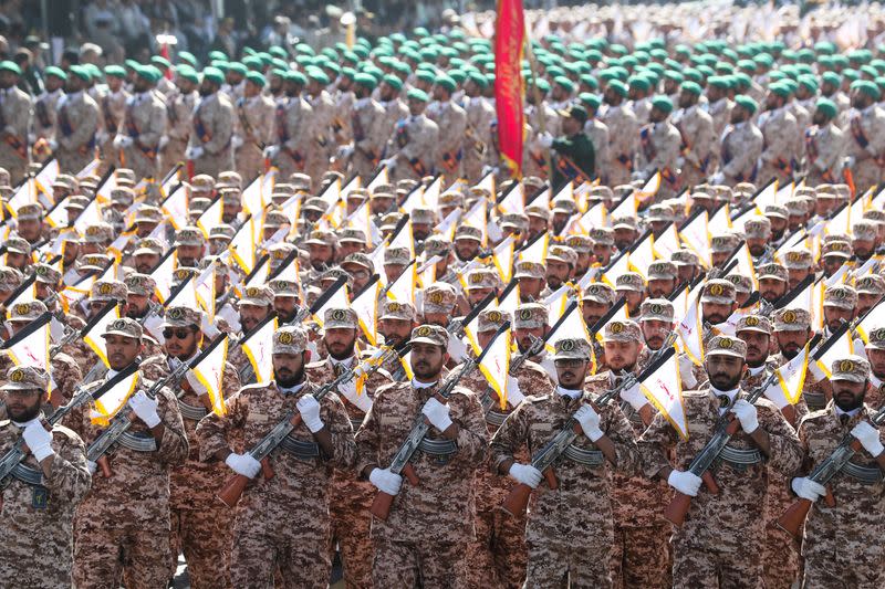 Iranian armed forces members march during the annual military parade in Tehran