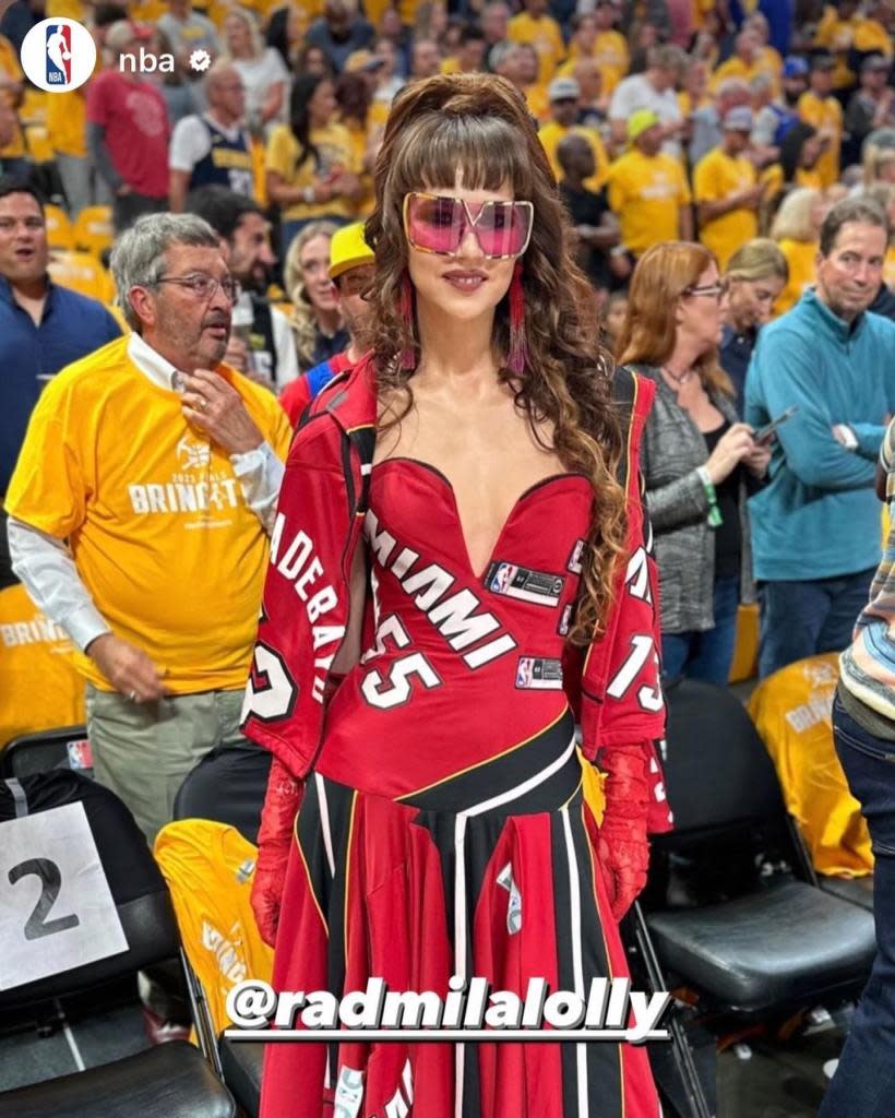 Radmilla Lolly, a professional opera singer and designer, went viral in 2022 for her basketball jersey gowns she made from jerseys. Today, she has a full collection sold at Miami Heat games. radmilalolly/Instagram