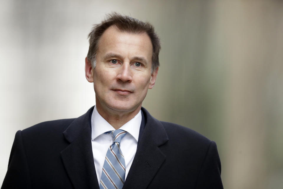 FILE - In this Wednesday, March 13, 2019 file photo, Britain's Foreign Secretary Jeremy Hunt arrives for a cabinet meeting at 10 Downing Street in London. Prime Minister Theresa May’s announcement that she will leave 10 Downing Street has set off a fierce competition to succeed her as Conservative Party leader _ and as the next prime minister. (AP Photo/Matt Dunham, File)