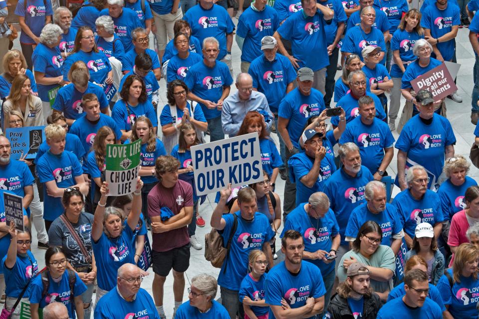 A sea of blue fills the atrium during the Love them Both Rally hosted by Right to Life Indiana at the Indiana Statehouse, Tuesday, July 26, 2022 in Indianapolis, Ind.  Indiana legislature are in a special session to discuss abortion law.