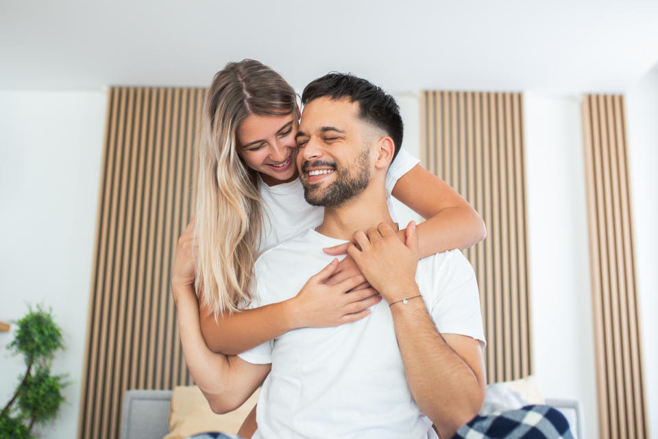 a young couple hugging