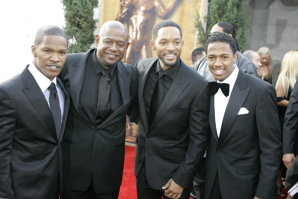 (L-R) Jamie Foxx, Forest Whitaker, Will Smith, and Nick Cannon arrive at the 13th Annual Screen Actors Guild Awards on Sunday, Jan. 28, 2007, in Los Angeles. (AP Photo/Chris Carlson)