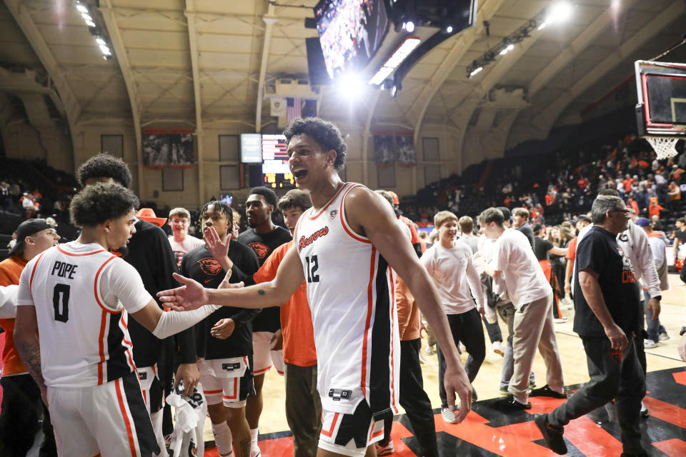 Oregon State forward Michael Rataj (12) celebrates the team's 83-80 win over Arizona in an NCAA college basketball game Thursday, Jan. 25, 2024, in Corvallis, Ore. (AP Photo/Amanda Loman)