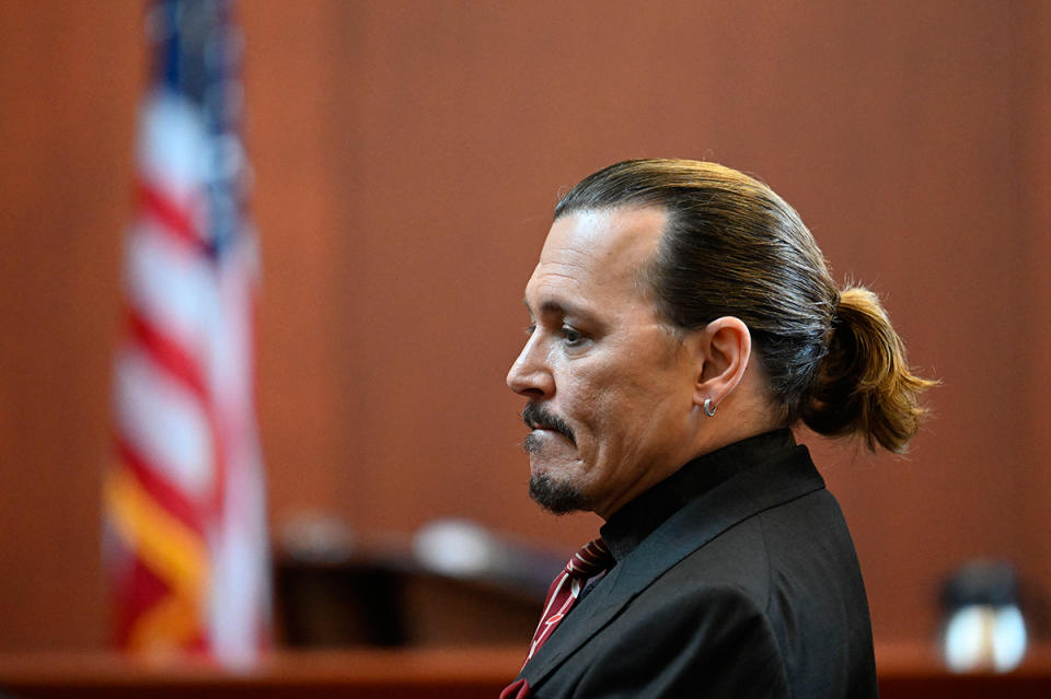 US actor Johnny Depp looks on during a hearing at the Fairfax County Circuit Courthouse in Fairfax, Virginia, on May 3, 2022. - US actor Johnny Depp sued his ex-wife Amber Heard for libel in Fairfax County Circuit Court after she wrote an op-ed piece in The Washington Post in 2018 referring to herself as a 