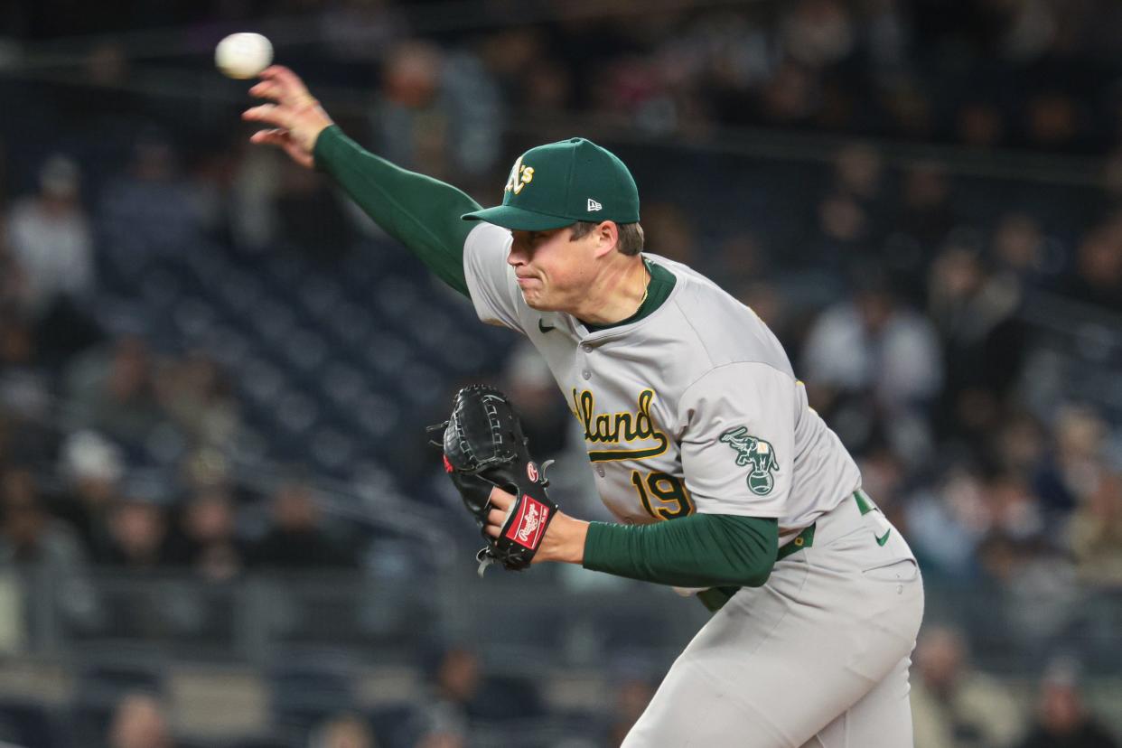 Apr 25, 2024; Bronx, New York, USA; Oakland Athletics relief pitcher Mason Miller (19) delivers a pitch during the eighth inning against the New York Yankees at Yankee Stadium. Mandatory Credit: Vincent Carchietta-USA TODAY Sports