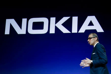 FILE PHOTO: Rajeev Suri, Nokia's President and Chief Executive Officer, speaks during the Mobile World Congress in Barcelona, Spain February 25, 2018. REUTERS/Yves Herman/File Photo