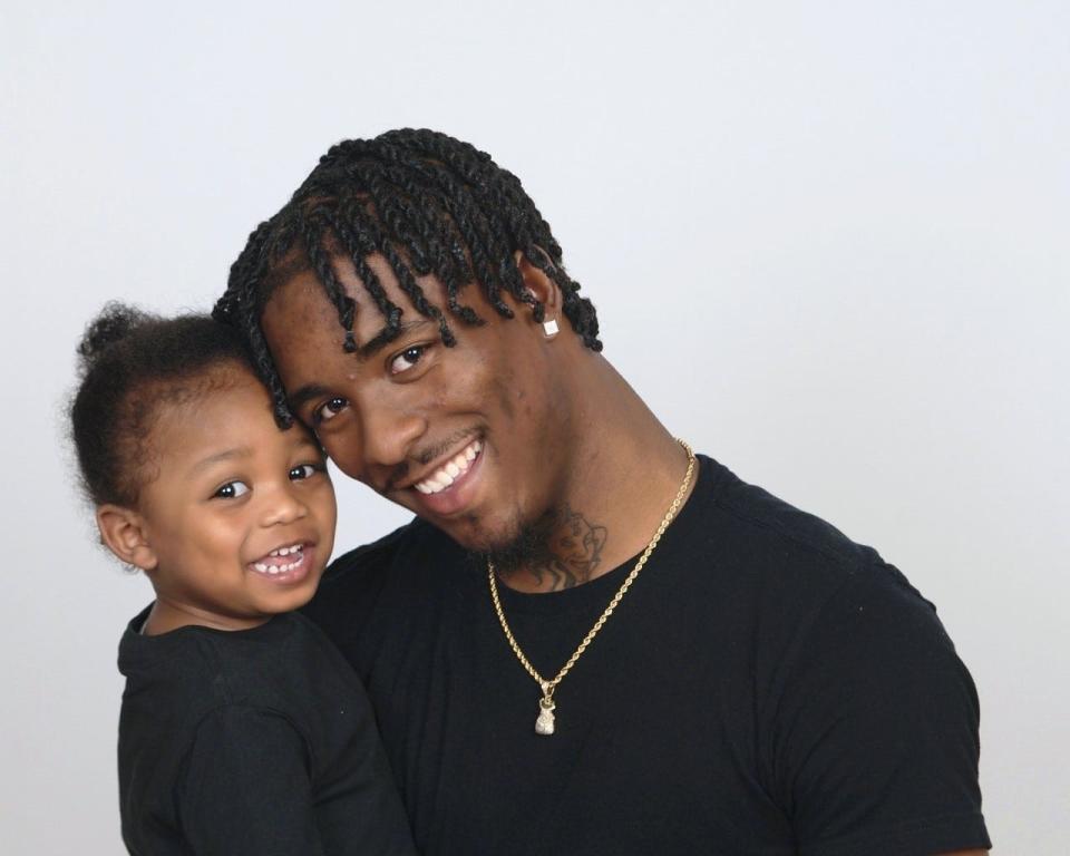 Hakimye Bethea with his 2-year-old son Suhmeir.