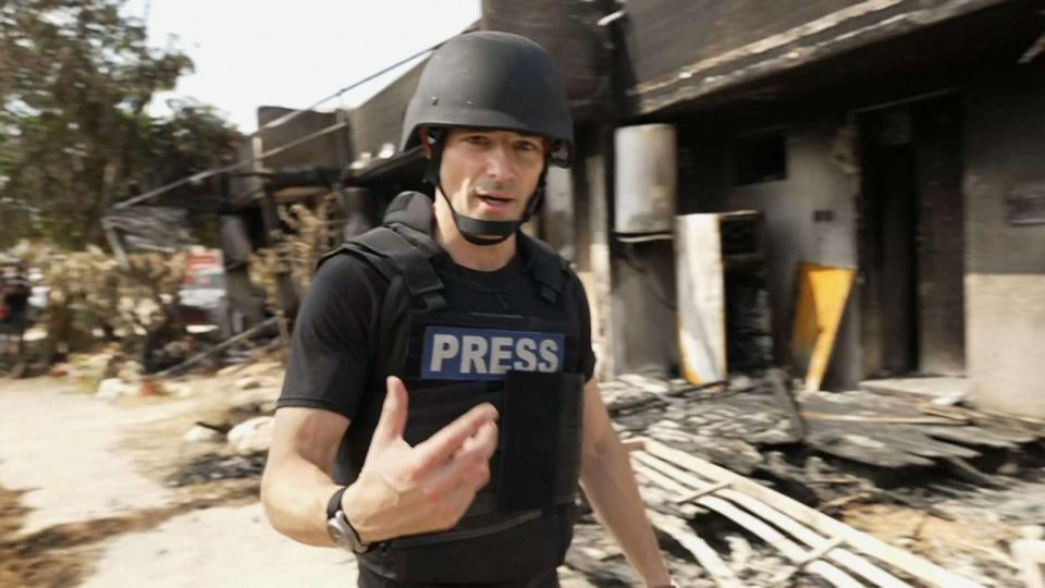 PHOTO: ABC's Matt Gutman reports from a kibbutz in Kfar Aza, Israel, Oct. 10, 2023, where militants attacked, and killed scores of people days earlier. (ABC News)