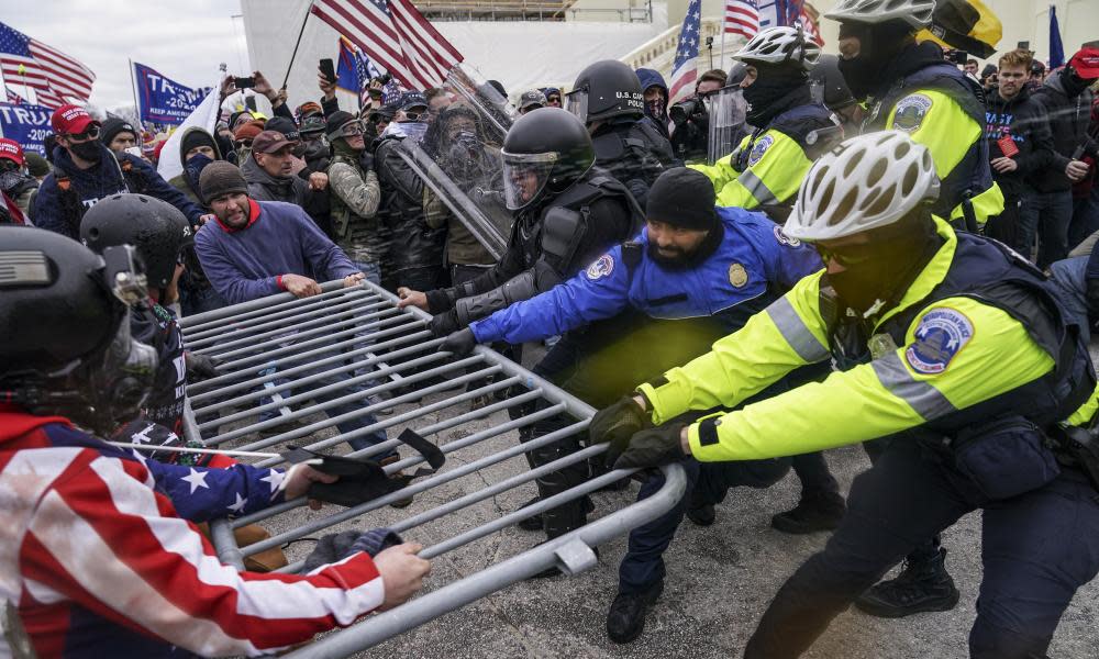 <span>Photograph: John Minchillo/AP</span>