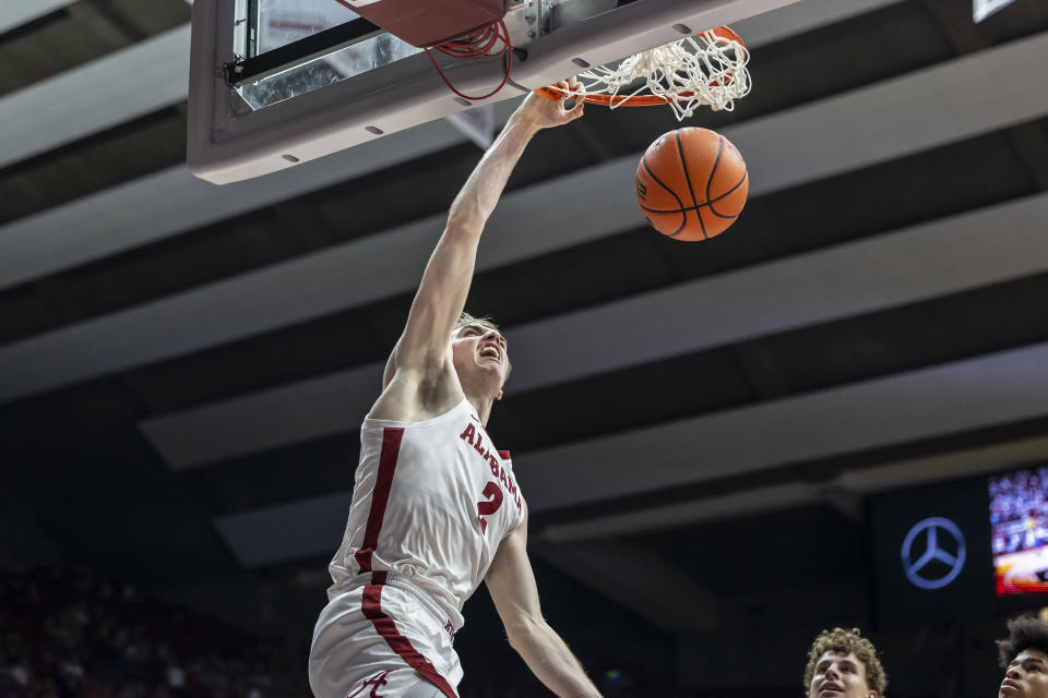 Alabama forward Grant Nelson dunks against Florida during the first half of an NCAA college basketball game Wednesday, Feb. 21, 2024, in Tuscaloosa, Ala. (AP Photo/Vasha Hunt)