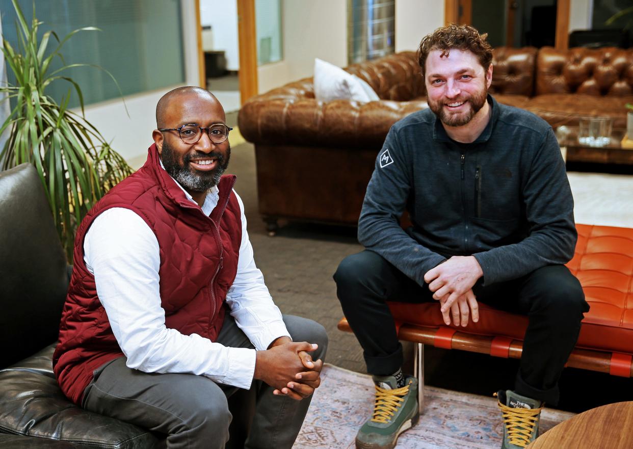 Maurice Thomas, president of Forward 48, left, and Ian Abston, founder of Forward 48, sit in their downtown office at 207 E. Michigan St. in Milwaukee. Forward 48 is a networking program for young professionals across Wisconsin.