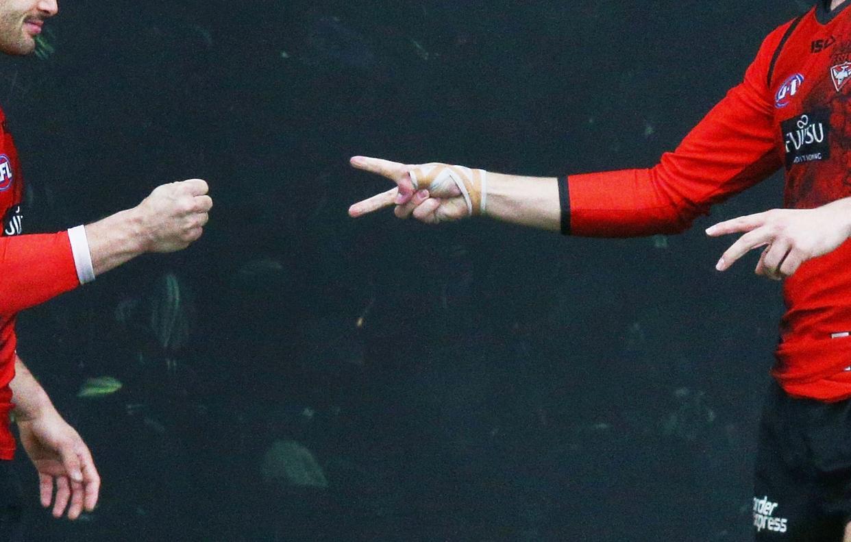 An English soccer referee improvised when he forgot his coin for the coin toss — and paid the price. (Getty)