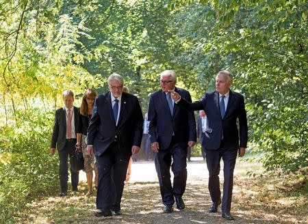 German Foreign Minister Frank-Walter Steinmeier (C), Poland's Foreign Minister Witold Waszczykowski (L) and French Foreign Minister Jean-Marc Ayraultin arrive to the Weimar Triangle meeting in Weimar, Germany, August 28, 2016. REUTERS/Jens Meyer/Pool