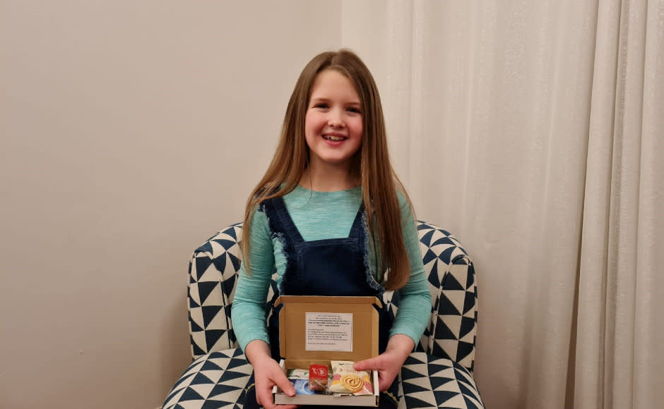 Nine-year-old Lily White used money intended for her birthday party to send 100 lonely OAPs boxes of tea and coffee, and cakes and biscuits. (SWNS)