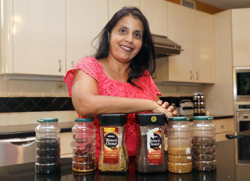 Indu Rajan, an immigrant from Chennai, India, where Kamala Harris' mother's side of the family hails from, with jars of Tasters Choice coffee at her Croton home  Aug. 13, 2020. 