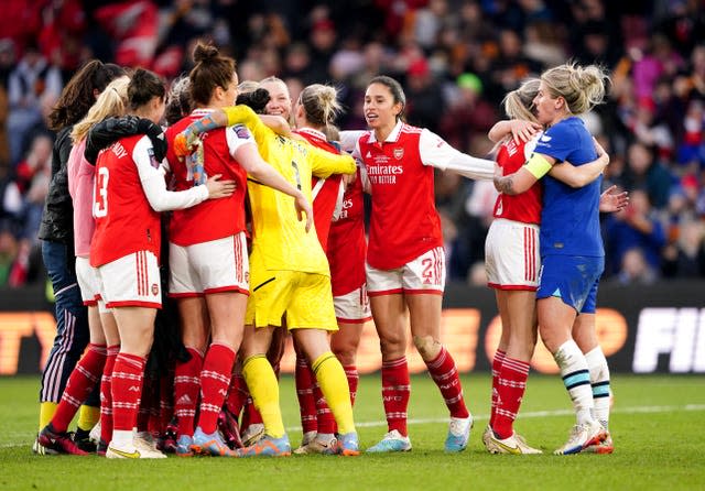 England team-mates Leah Williamson of Arsenal and Chelsea’s Millie Bright embrace at the end as Arsenal players celebrate 