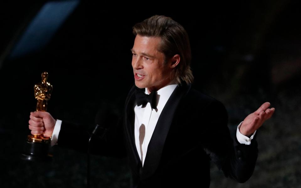 Brad Pitt, who won a Best Supporting Actor Oscar in 2020, may well be a presenter this year - REUTERS/Mario Anzuoni